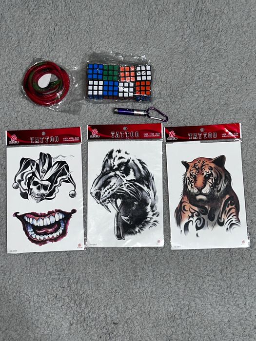 Mini-colectie: tatuaje, brelocuri, laser și șarpe – preț negociabil,l