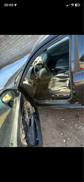 Митсубиши каризма