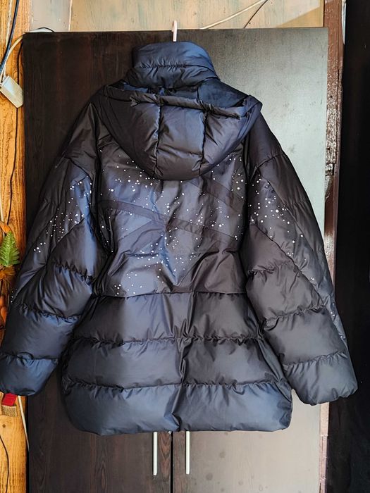 Чисто ново пухено зимно яке от серия Training на Reebok