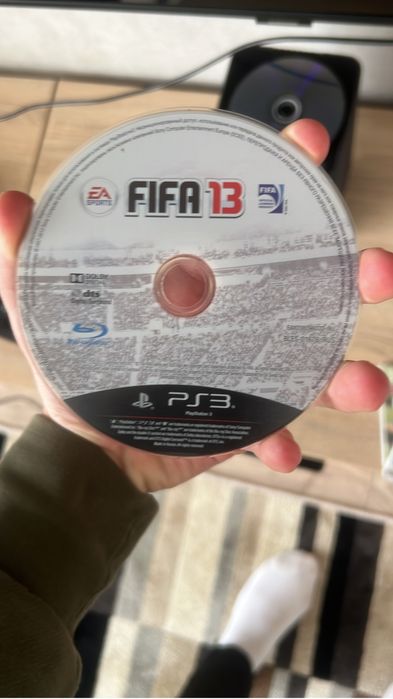 Геймпад на PS 3 и три диска с играми
