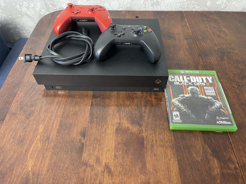 XBOX one X + 1 disc