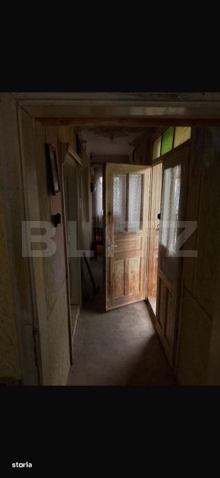 Casa cu 3 camere si un teren de 3000 mp