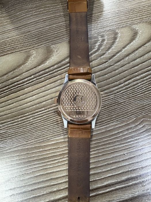 Продам золотые мужские часы