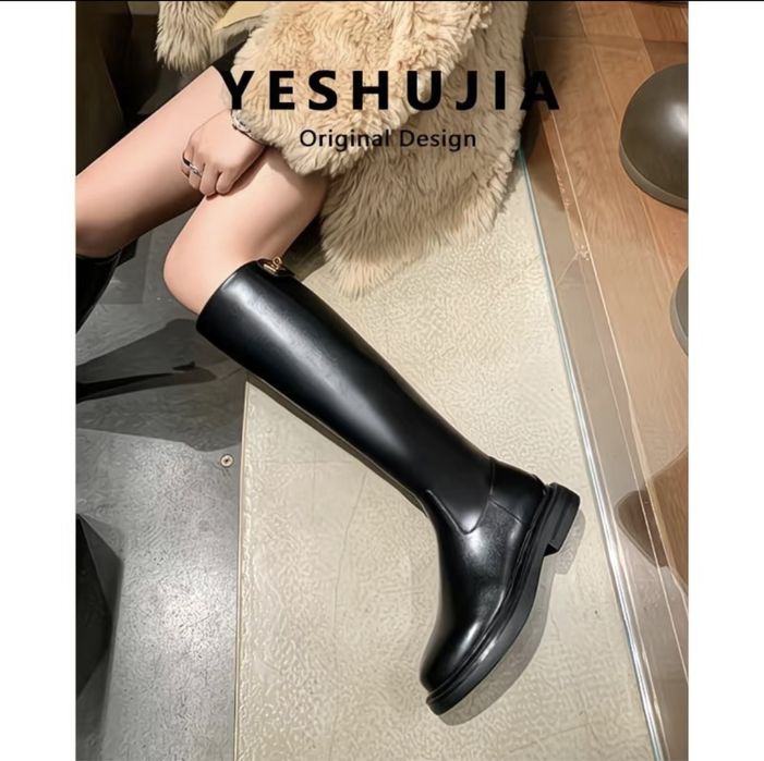 Продается новые женские сапоги