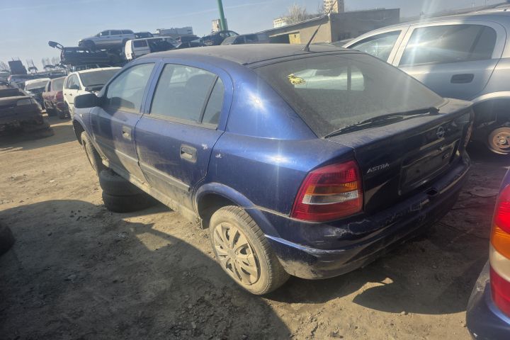 Far stanga Opel Astra 2003 1.4 MT (90 hp)