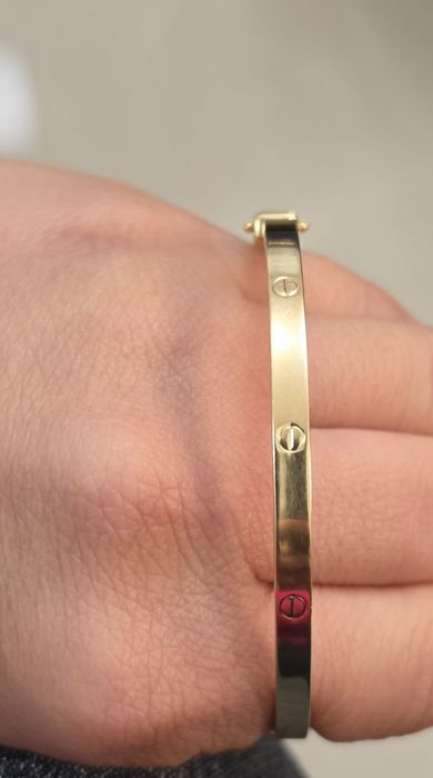 Bratara aur 14k dama Cartier