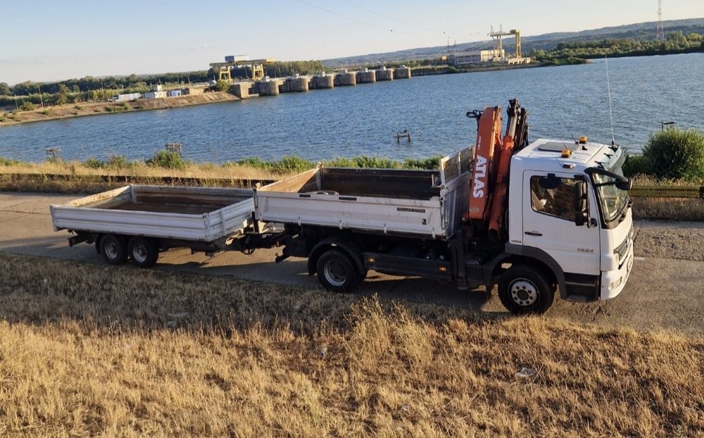 Transport cu macara basculabil
