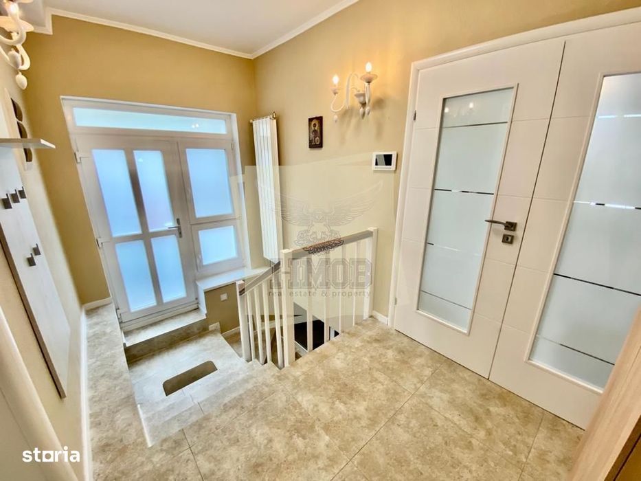 Casa cu 4 camere 3 bai 2 terase si teren 450 mp in zona Parcul Sub Ari