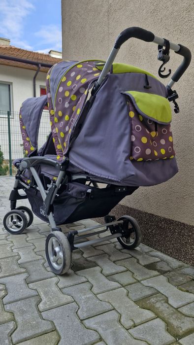 Двойна количка за близнаци или породени деца