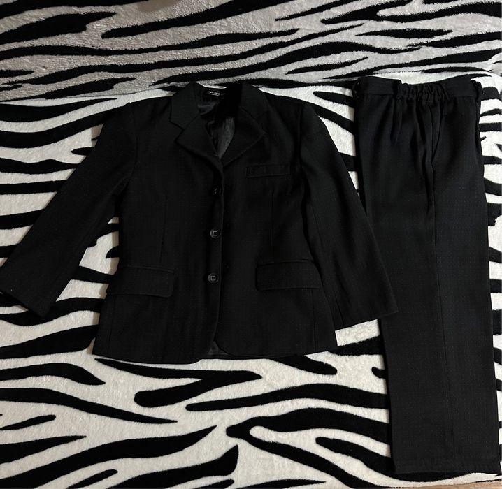 Продам костюм на мальчика 5-7 лет.