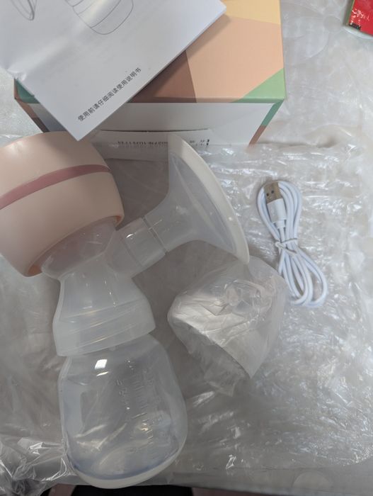 Новый молокоотсос электронный