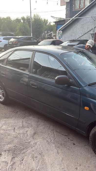 Tayota Carina e Автомат обьем 2.0