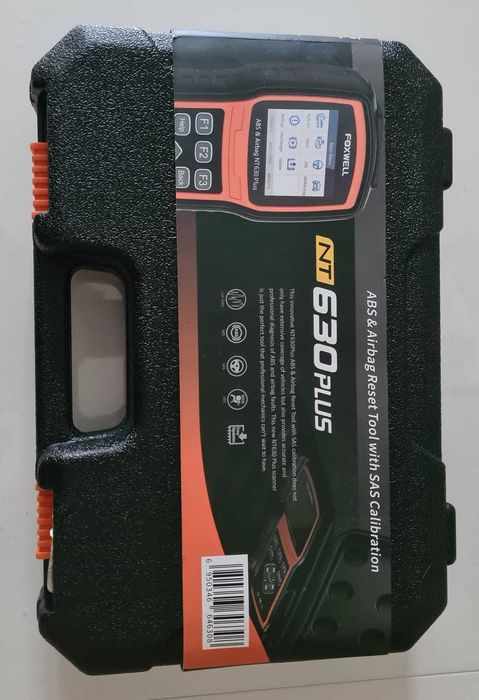 Это автомобильный сканер Foxwell NT630 Plus.