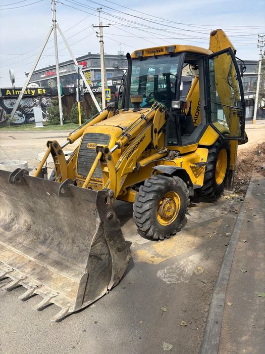 Экскаватор погрузчик 3в1