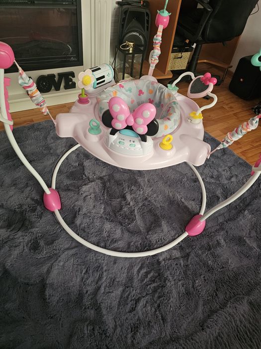 Premergator Disney Baby MINNIE MOUSE, Bright Starts, cu lumini si melodii, pentru copii de la 6 luni