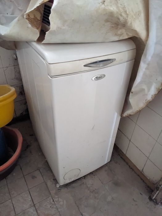 Пералня с горно зареждане