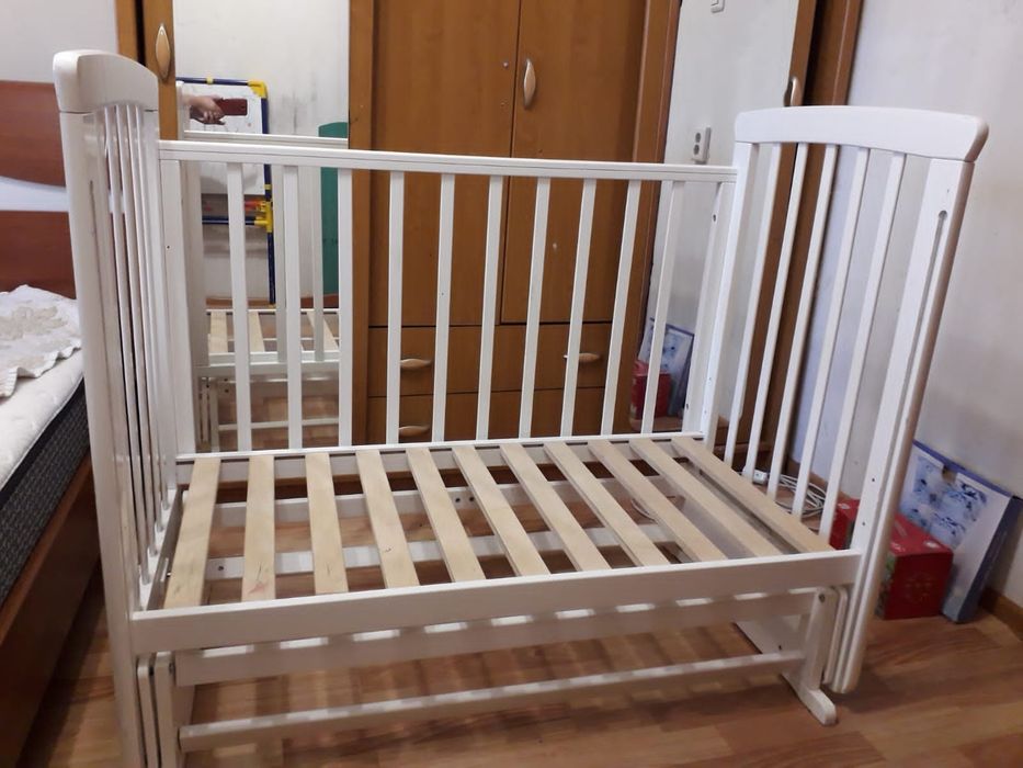 Детская кроватка механизм маятник