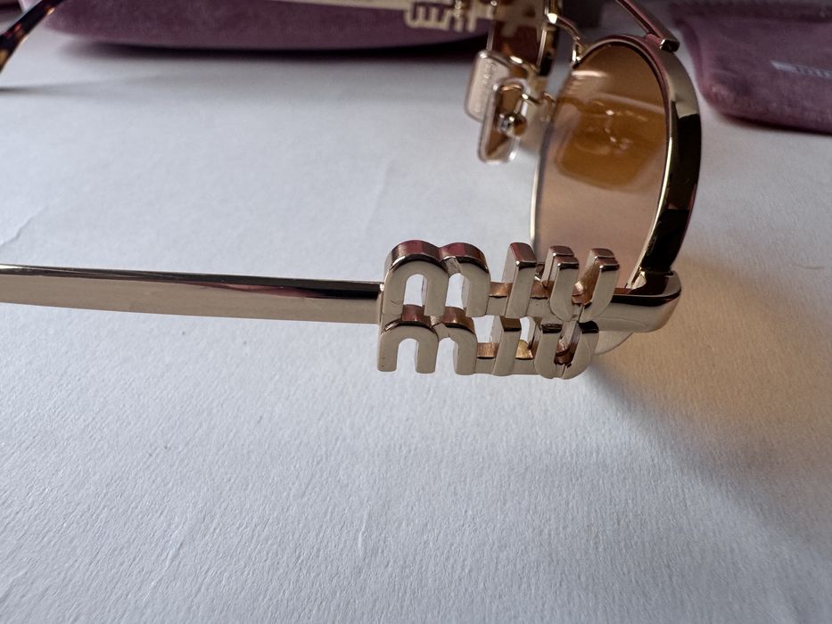 Ochelari de soare Miu Miu SMU54ZS 53-19 140, Noi