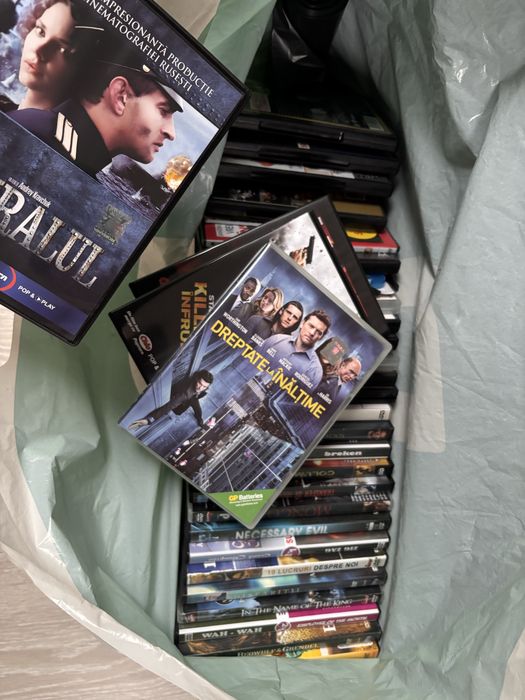 75 de DVD cu filme