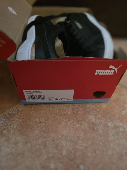 Puma Black and Gold Sneakers