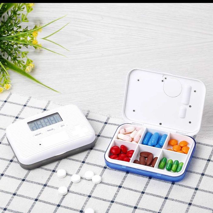 Cutie de medicamente cu alarma