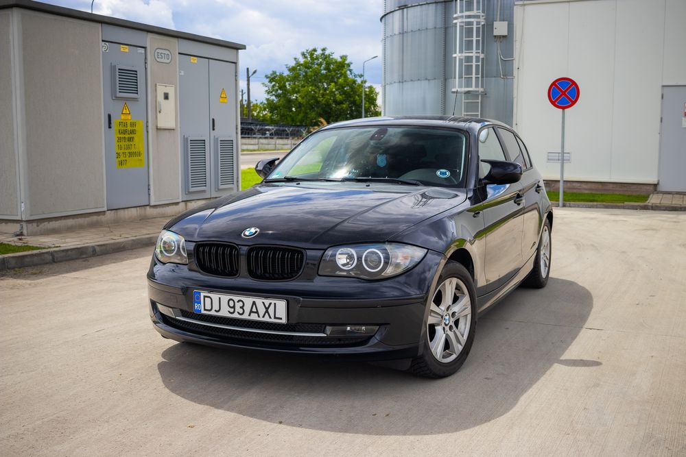 BMW Seria 1 116i (122 CP) • 2011 • Negru • Lupe Bi-LED • Încălzire scaune • Multe dotări