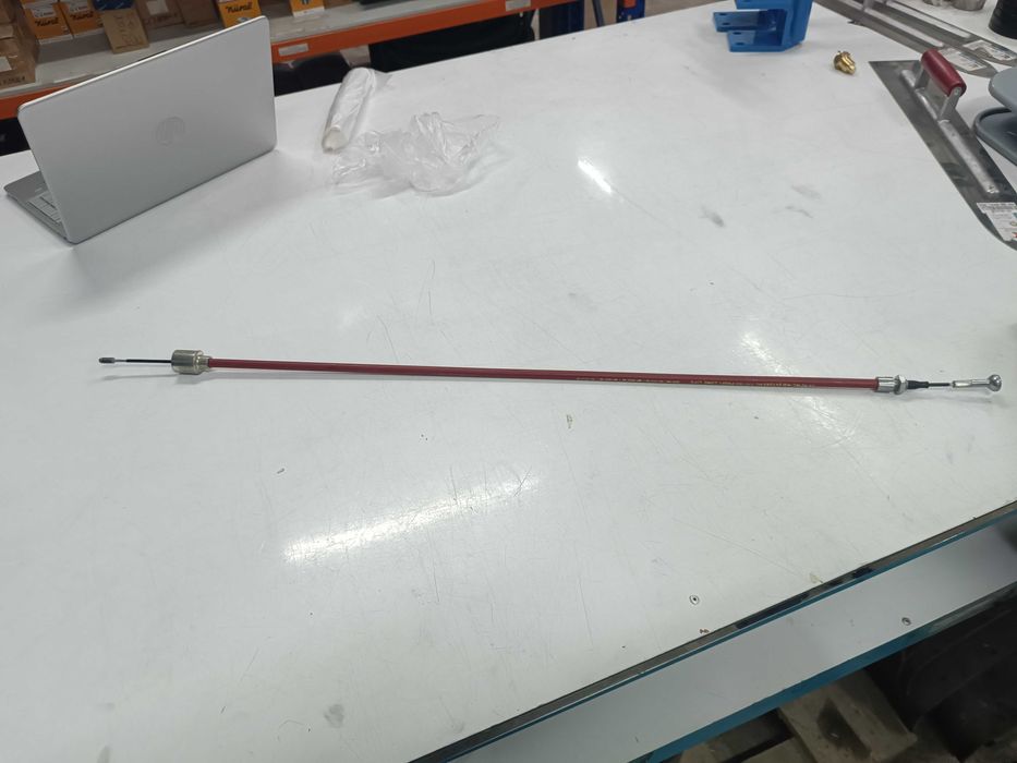 Трос ручного тормоза