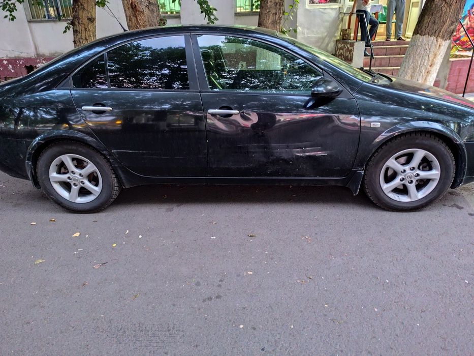 Машина Nissan Primera