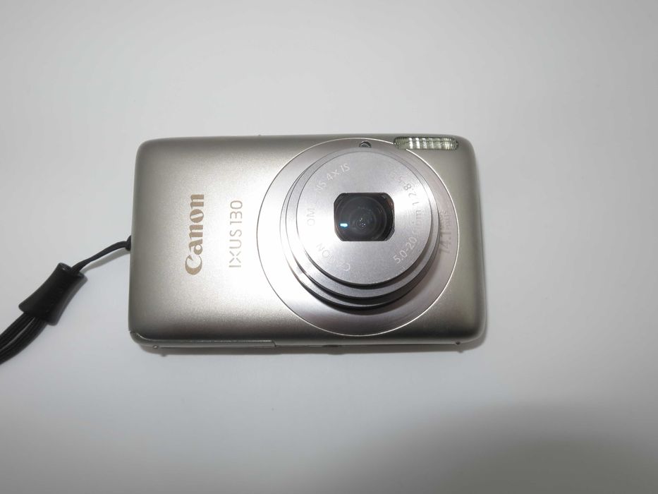 Canon IXUS 130 ултра компактен цифров фотоапарат, дигитална камера в сребърен цвят, 14MP, отлично състояние, пълен комплект, работи перфектно!
