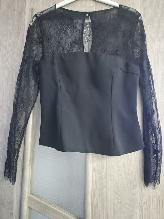 Top damă mărimea M.Pret 60roni