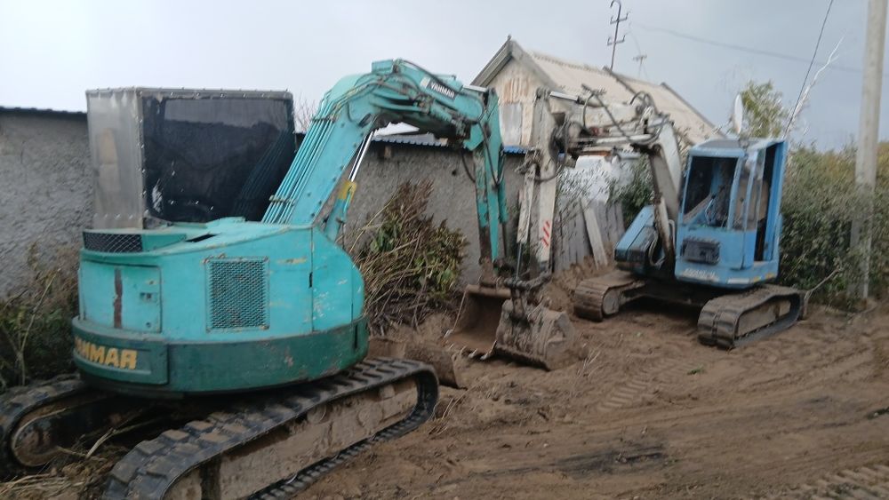 Услуги мини экскаватора ,Мультик ,водопровод ,кабель ,мини трактор