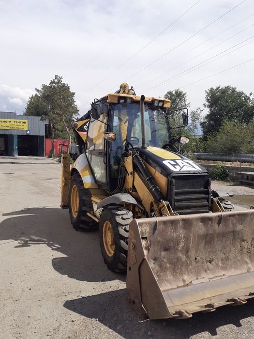 Эксковатор погрузчик услуга