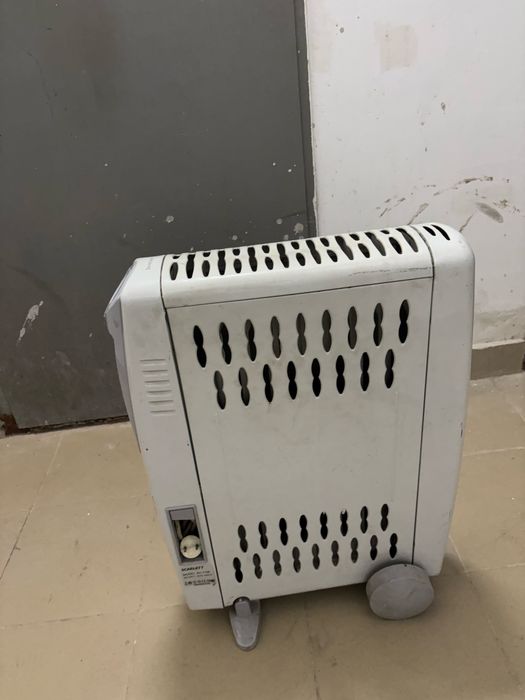 Обогреватель масленый  фирма Scarlett