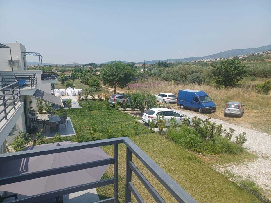 Продава нова лукс къща 72 м2 двор 557 м2 в Паралия Каряни, Гърция