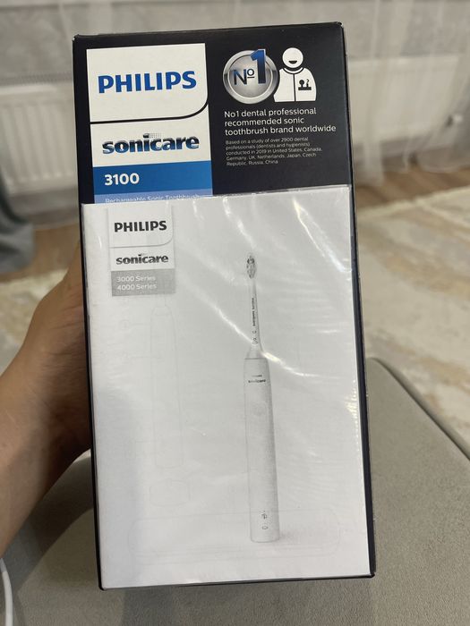 Электрическая зубная щетка новая