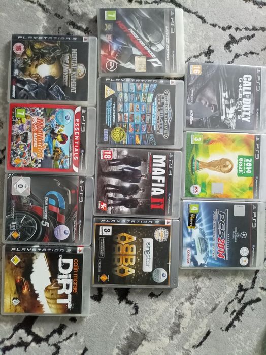 PlayStation 3  + 3 manete și jocuri