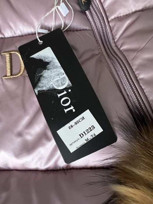 Продам новый зимний комбинезон