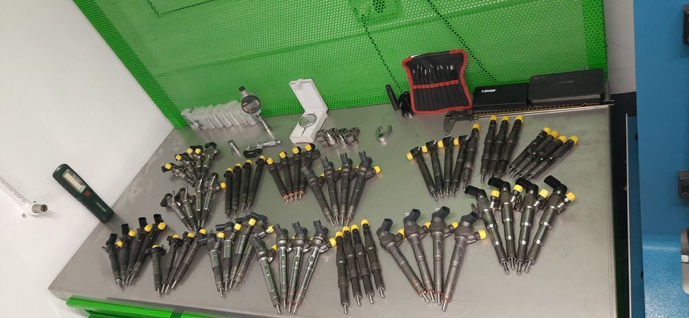 Vand injectoare reconditionate ford 1.6 continental
