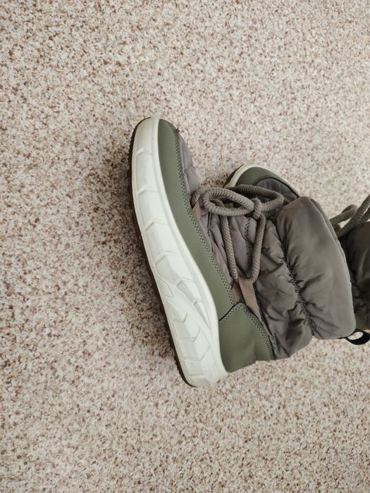 Женьская зимныи обувь