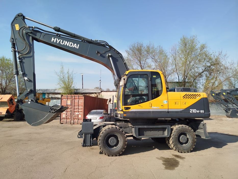 Экскаватор колесный услуги