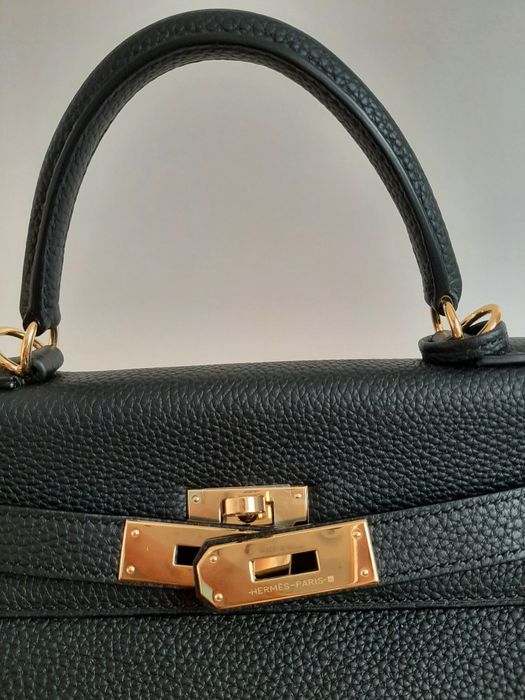 Сумка на ремне и с ручкой