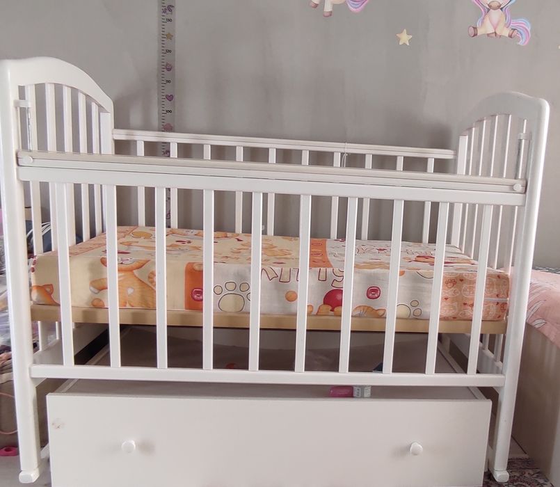 Детская кровать -манеж с маятником