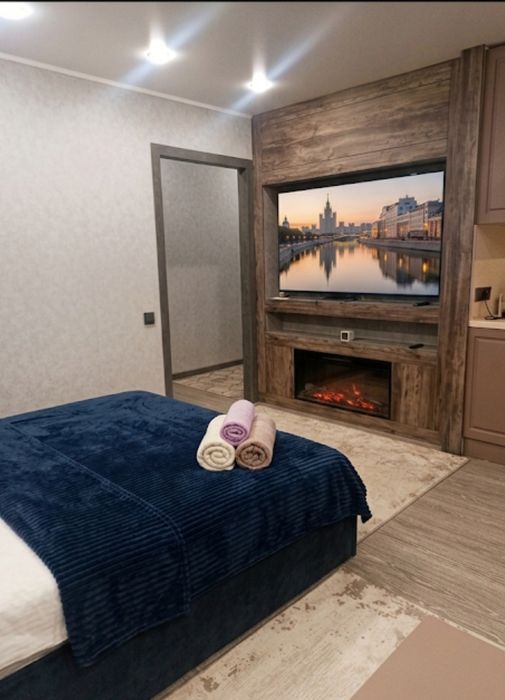 Студия с камином