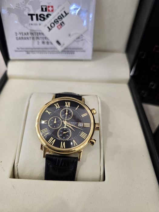 Продам золотые часы Tissot