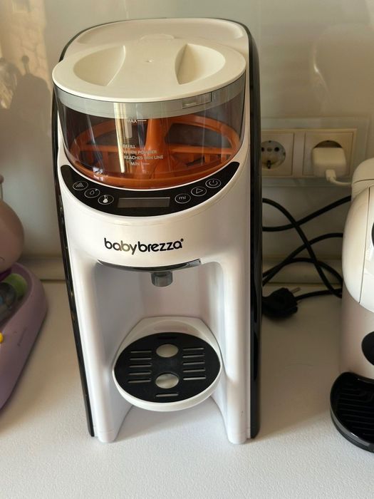 Уред за приготвяне на адаптирано мляко