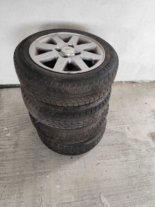 Vând 8 jante din aluminiu R14 si 8 cauciucuri, 4 Continental de vară și 4 Dunlop de iarna