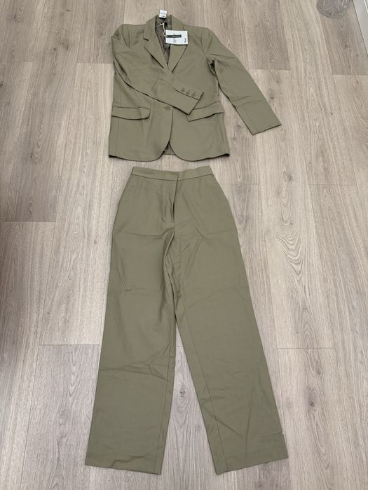 Новый костюм (пиджак и брюки)