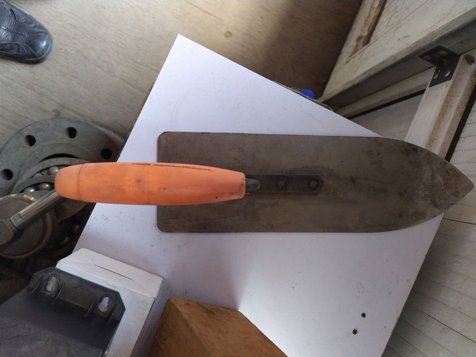 Кельма каменщика