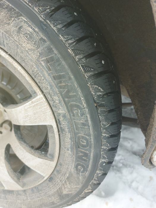 Продам литые диски с шипованной резиной