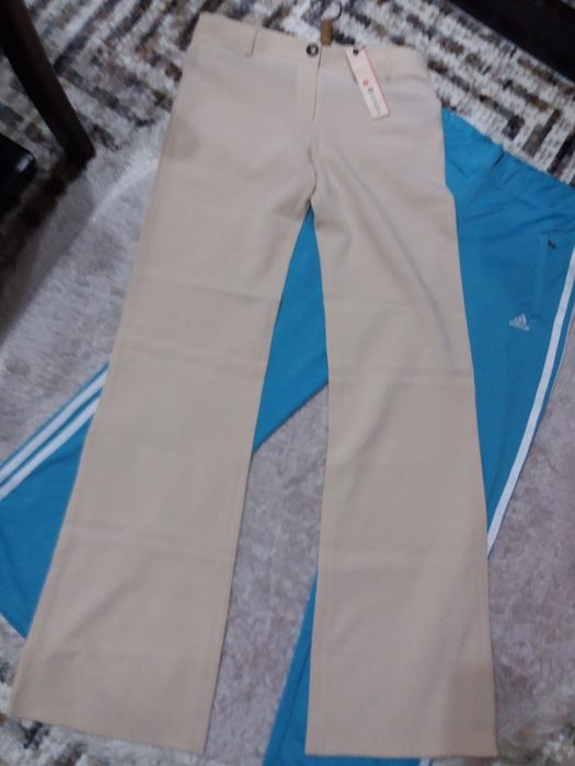брюки светлые 44/46разм. новые! Распродажа!